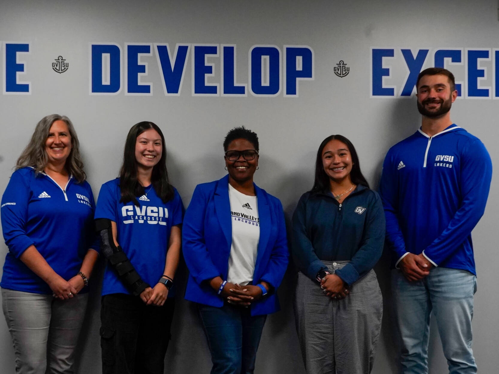 group photo from left to right of Marianne Fischer, Elora Ferrie, Myesha Gholston, Trinity Reynoso, and Andrew Beck